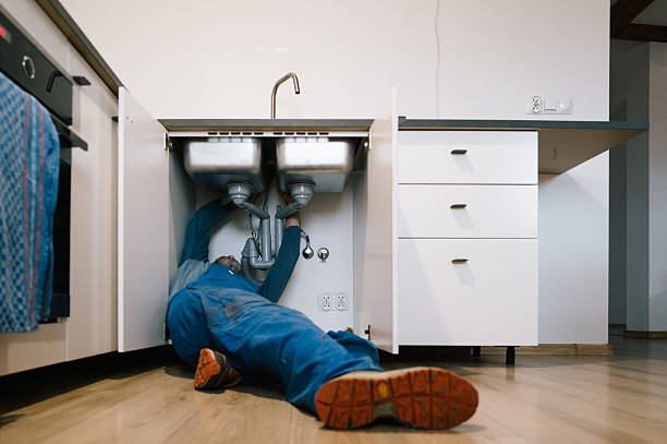 Professional Drain Cleaning technician working in Parker City, IN